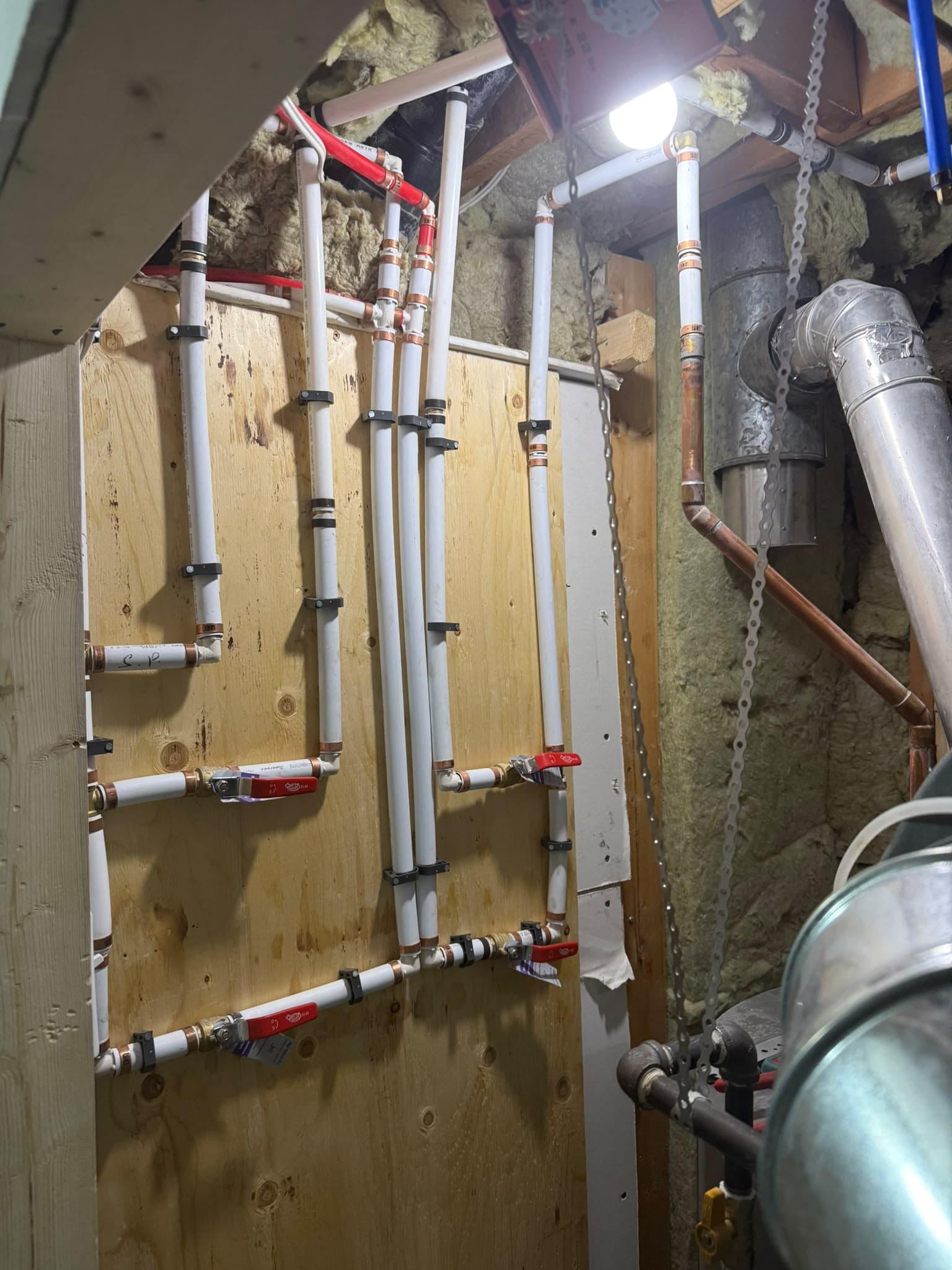Basement plumbing rough-ins after KDM's corrective work