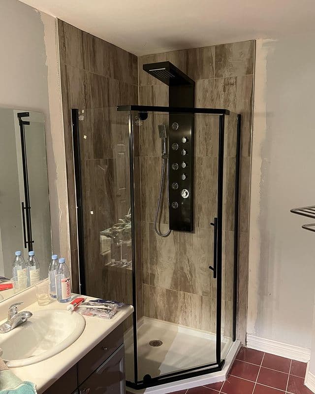 Barrier-free shower with grab bars and bench