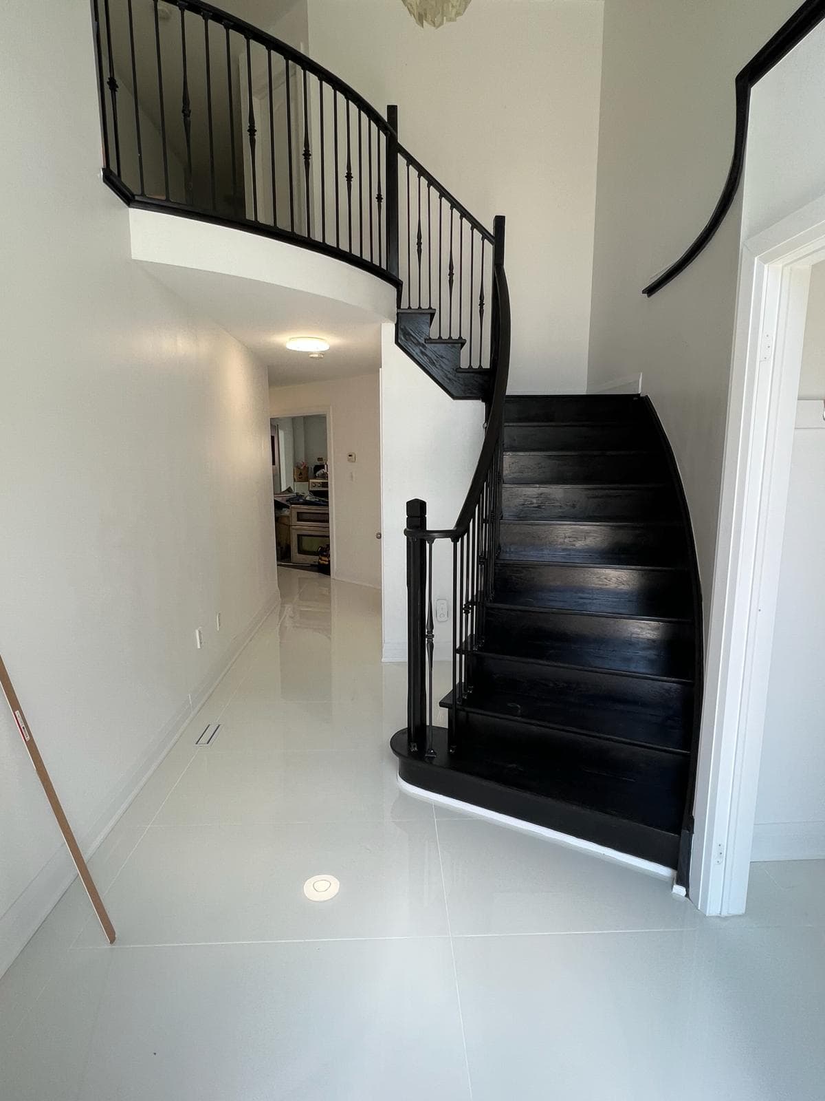 Stairs, kitchen, bathroom (white and black) in Mississauga (after)